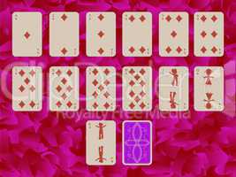 suit of diams playing cards on purple background