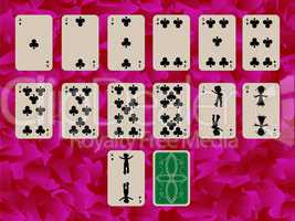 suit of clubs playing cards on purple background