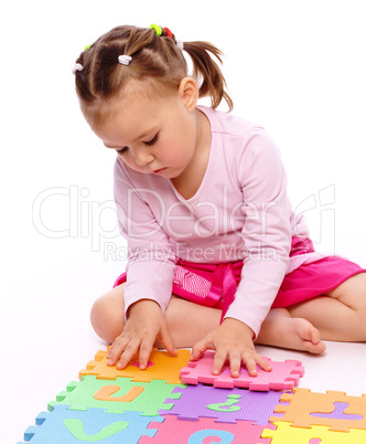 Little girl with alphabet