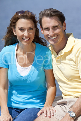 Successful Happy Middle Aged Man and Woman Couple Sitting Outsid