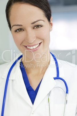 Attractive Brunette Woman Doctor With Stethoscope