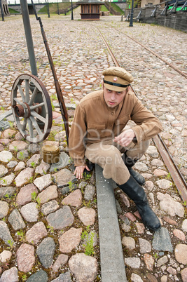 Retro style picture with resting soldier.