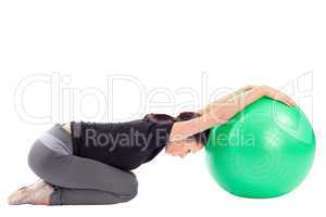 Woman Doing Gym Ball Exercise