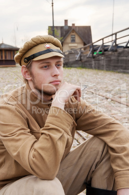 Retro style picture with resting soldier.