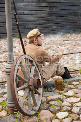 Retro style picture with resting soldier.