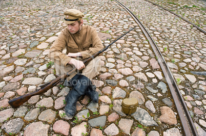 Soldier with boiler and gun in retro style picture