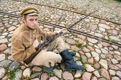 Soldier with boiler and gun in retro style picture
