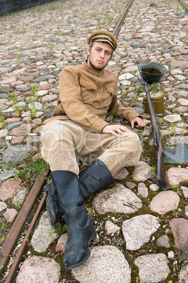 Retro style picture with resting soldier.