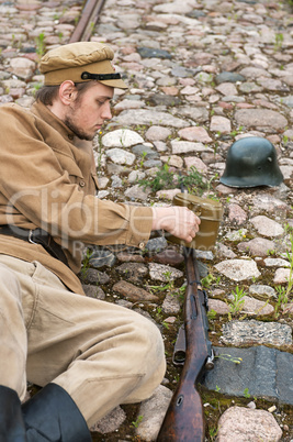 Retro style picture with resting soldier.