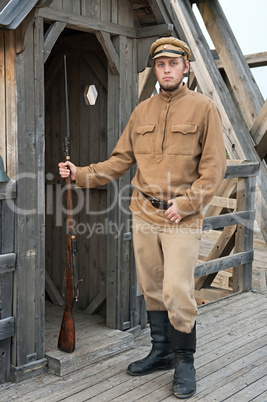 Retro style picture with soldier at sentry.