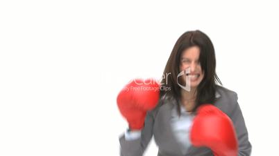 Geschäftsfrau mit Boxhandschuhen