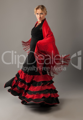 Beauty woman dance flamenco in black and red