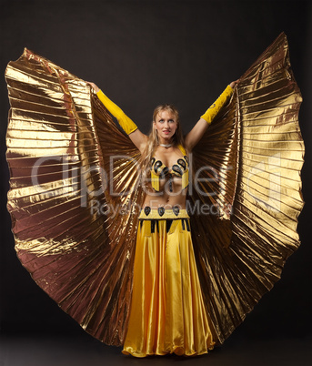 Beauty woman dance with gold wing