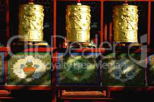 Golden prayer wheels in Tibet