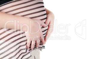 Pregnant woman hands in form of heart sign