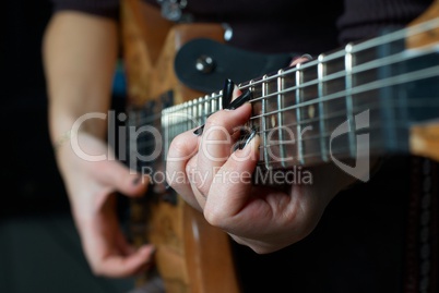 Playing on guitar