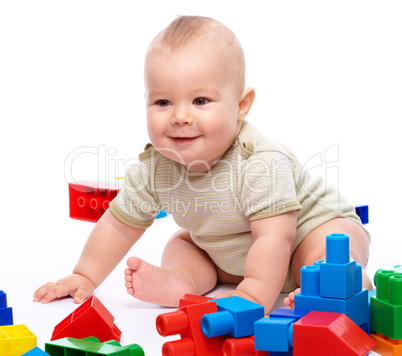 Little boy with building bricks