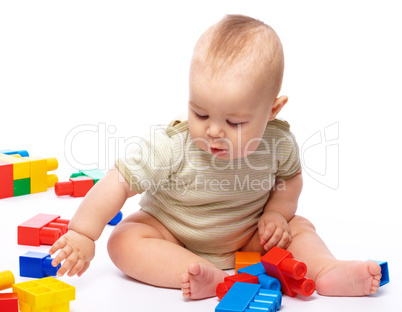 Little boy with building bricks