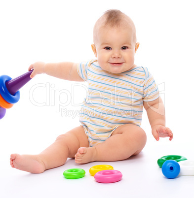Little boy play with toys