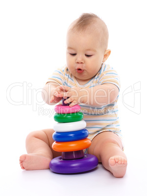 Little boy play with toys