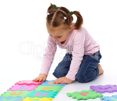 Little girl with alphabet