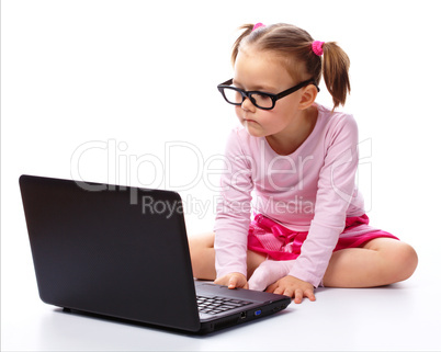 Little girl with laptop