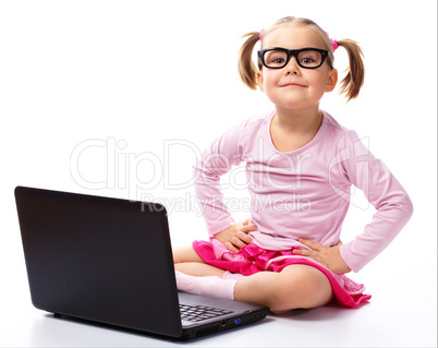 Little girl with laptop