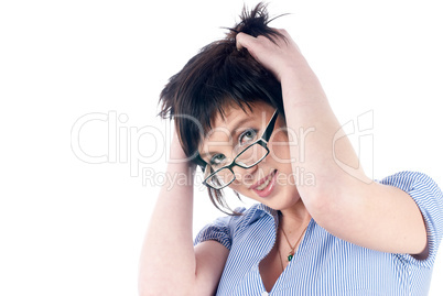 Woman with hands in hair