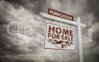 White Foreclosure Home For Sale Real Estate Sign Over Cloudy Sky