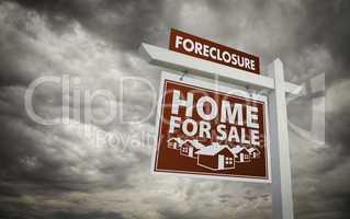 Red Foreclosure Home For Sale Real Estate Sign Over Cloudy Sky