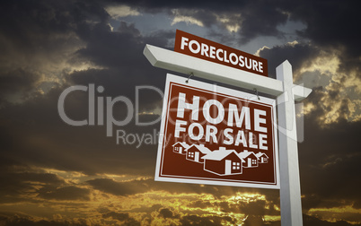 Red Foreclosure Home For Sale Real Estate Sign Over Sunset Sky