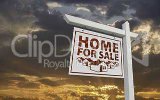 White Home For Sale Real Estate Sign Over Sunset Sky