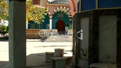Washing facilities outside colourful Turkish mosque 2