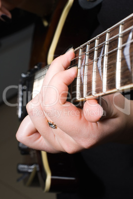 Playing on guitar