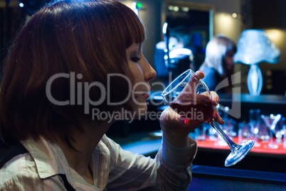 young women with wine glass