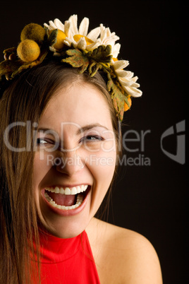 Smile young pretty woman with wreath