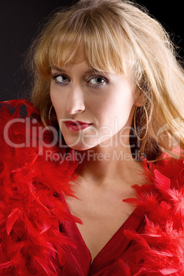 Beauty mature woman in red boa