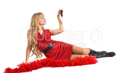 Beauty woman in red play with blade