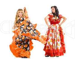 Two mature woman dance flamenco in gypsy costume