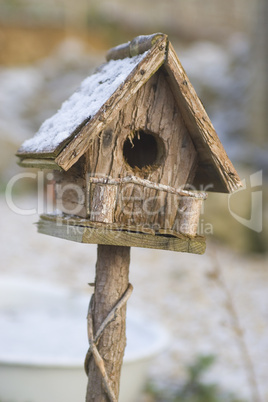 Birdhouse in the Snow