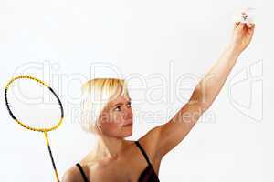 Junge Frau beim Badmintonspiel 705
