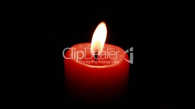 burning candle isolated