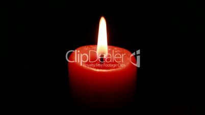 burning candle isolated