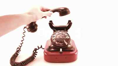 retro phone ringing on white background