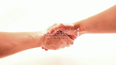 Shaking hands on white background