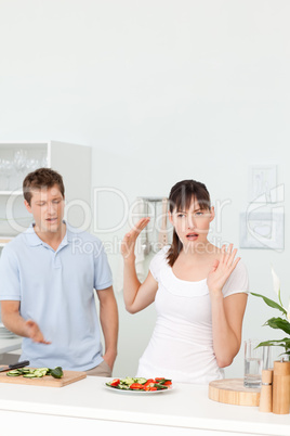 Young lovers having dispute in the kitchen