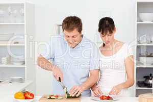 Lovers cooking together in the kitchen