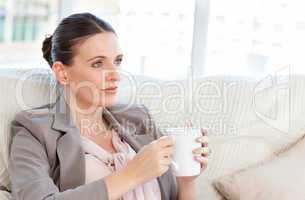 Businesswoman drinking a cup of coffee