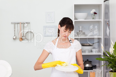 Woman washing dishes