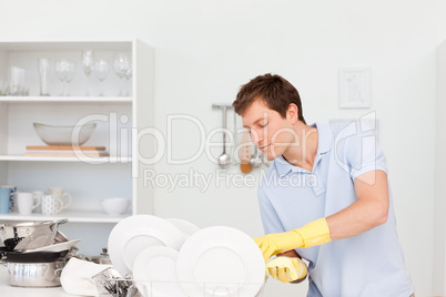 Man washing dishes